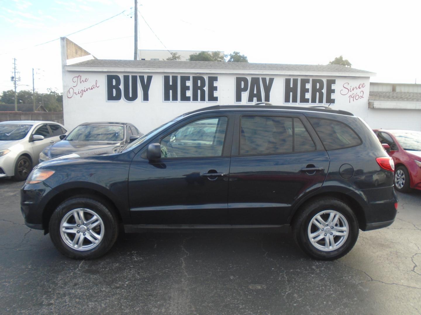 2011 Blue Hyundai Santa Fe GL 2.4 FWD (5XYZG3AB9BG) with an 4-Cyl, 2.4 Liter engine, Automatic, 6-Spd w/Overdrive and Shiftronic transmission, located at 6112 N Florida Avenue, Tampa, FL, 33604, (888) 521-5131, 27.954929, -82.459534 - Photo#0